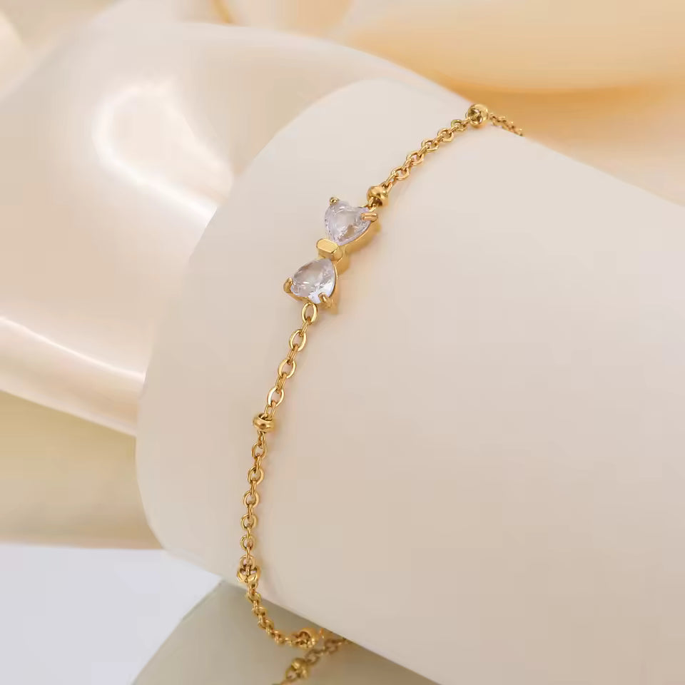 🎀 Zirkon-Schleifenarmband – Goldfarben, Edelstahl & Perlenkette🎀