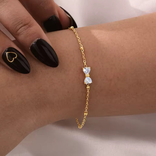 🎀 Zirkon-Schleifenarmband – Goldfarben, Edelstahl & Perlenkette🎀
