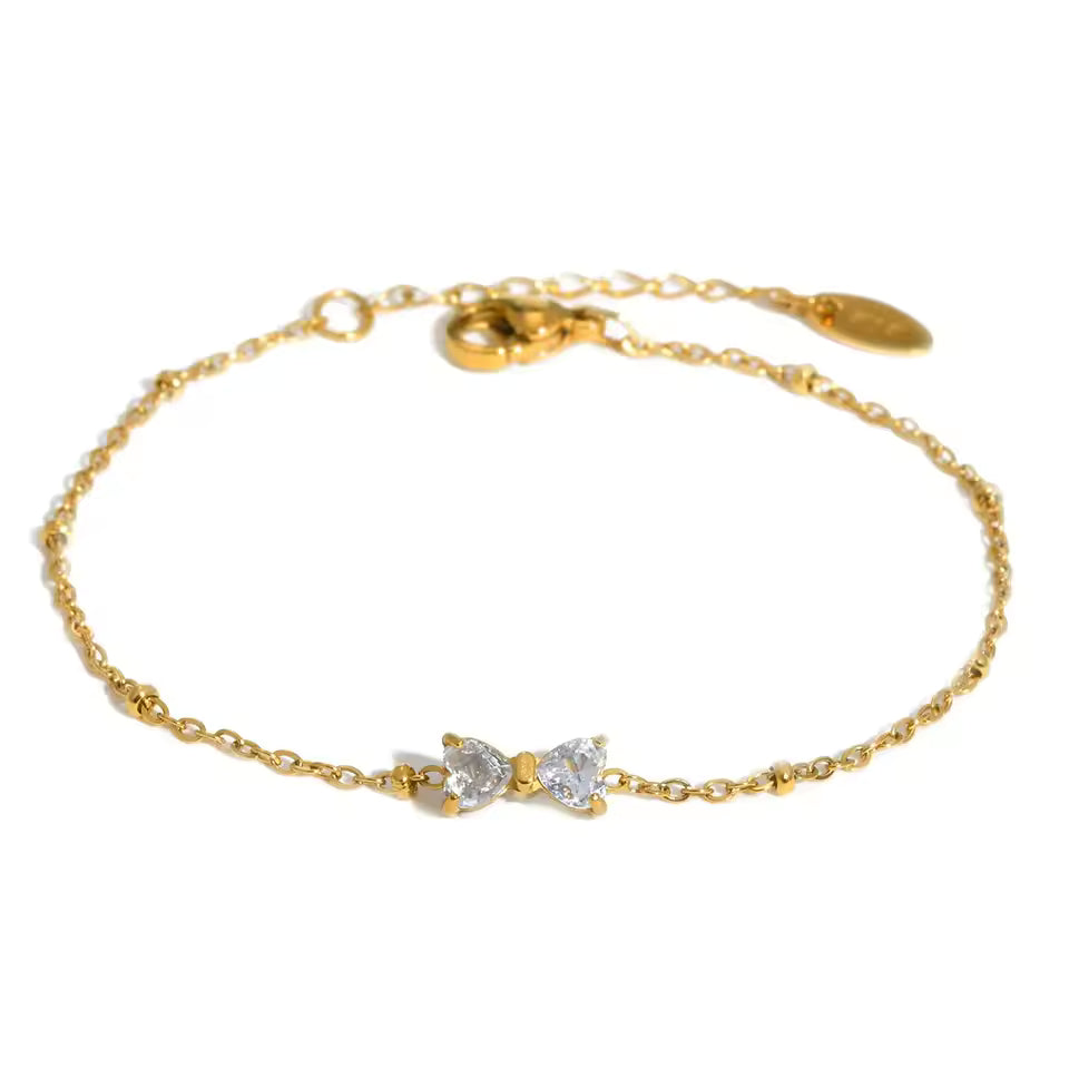🎀 Zirkon-Schleifenarmband – Goldfarben, Edelstahl & Perlenkette🎀