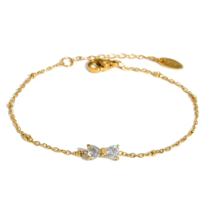 🎀 Zirkon-Schleifenarmband – Goldfarben, Edelstahl & Perlenkette🎀