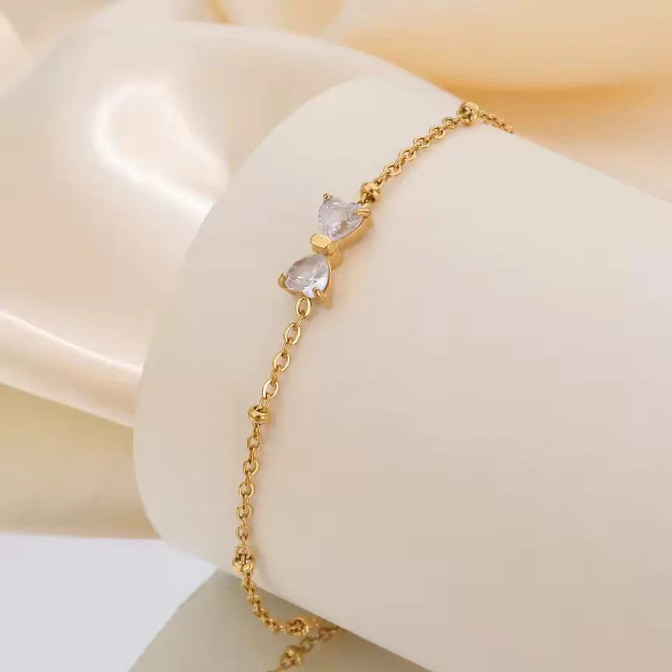 🎀 Zirkon-Schleifenarmband – Goldfarben, Edelstahl & Perlenkette🎀